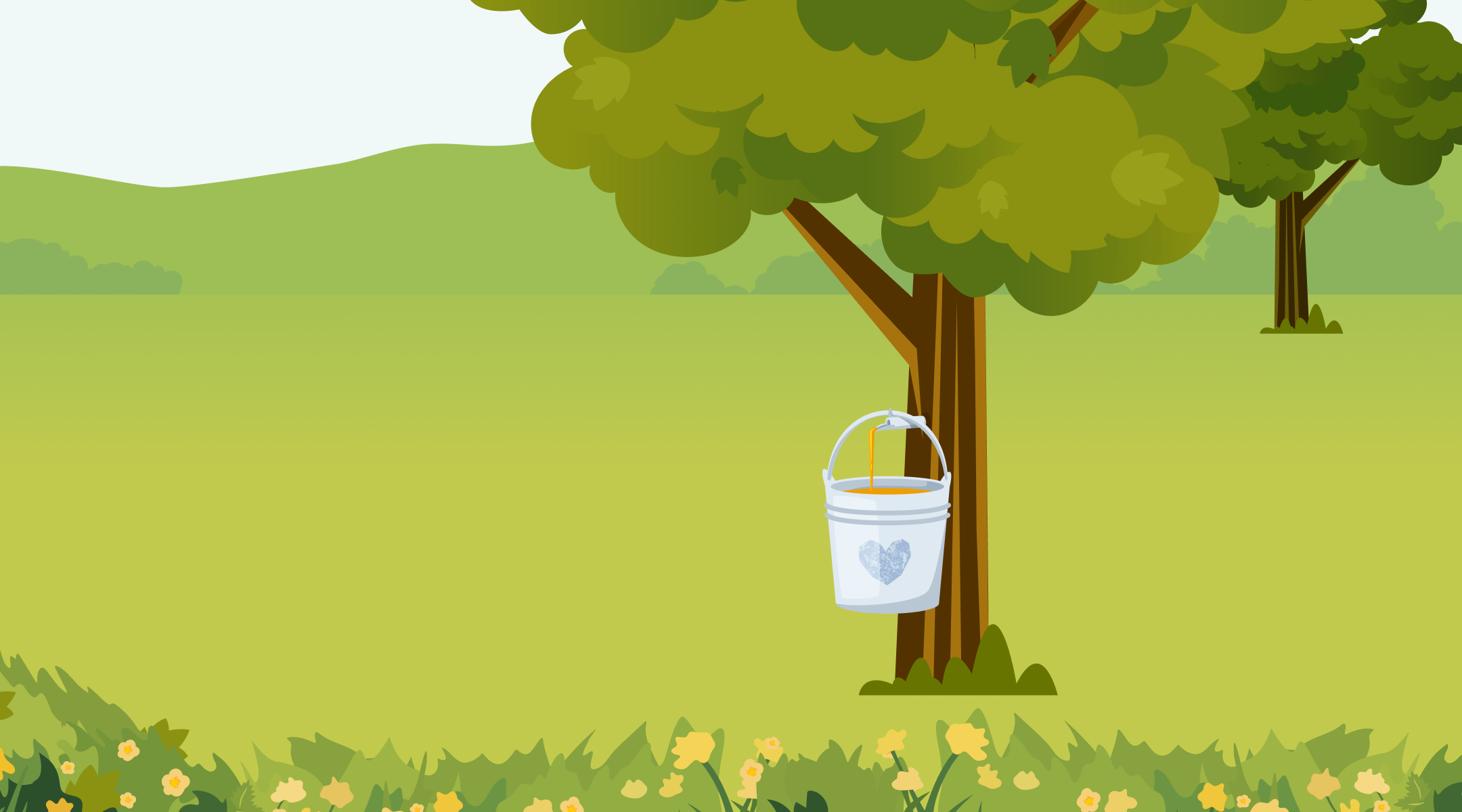 A white bucket with a heart design, used for collecting organic maple syrup, hangs from a tree in a grassy field with green hills, trees, and yellow flowers in the background.